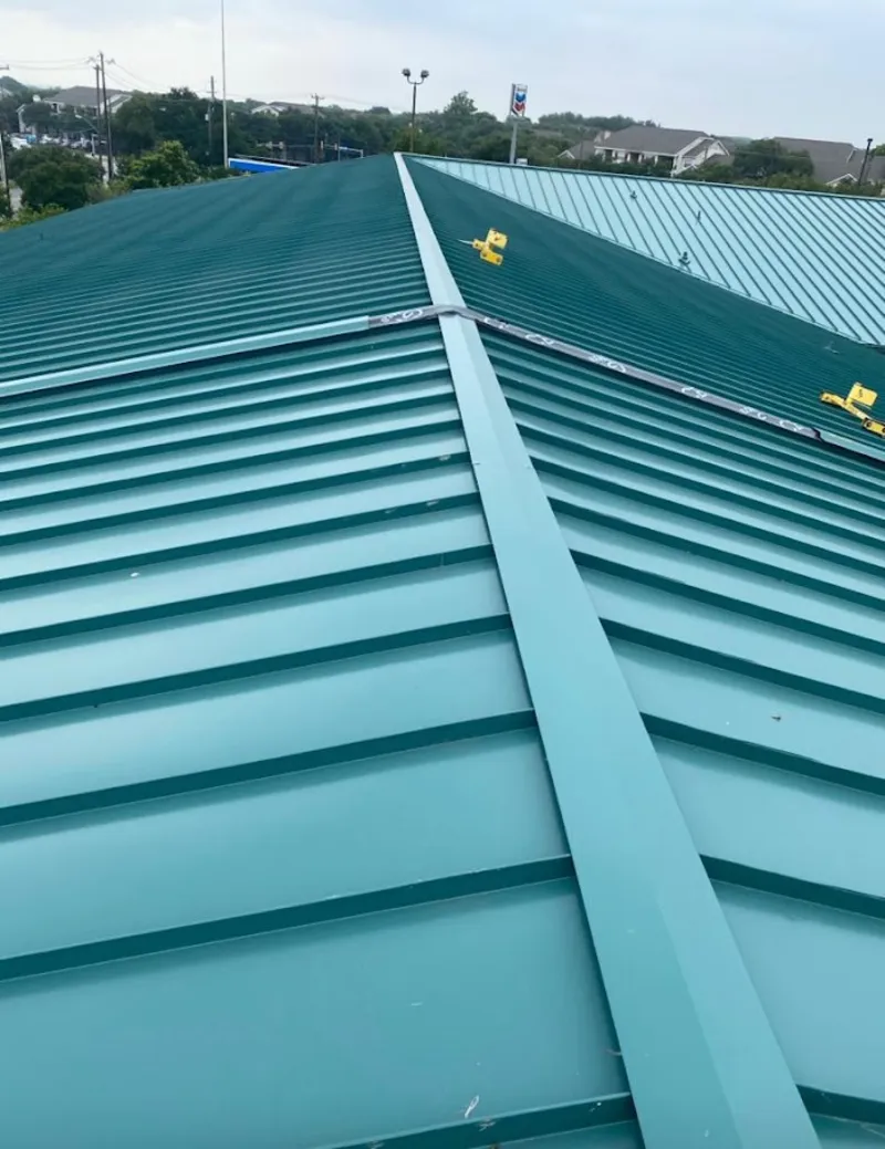 Green commercial metal roof ridge and valley for Metal Roof Repair in Chanhassen