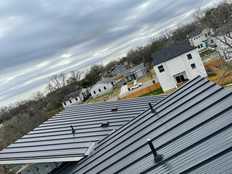 Standing seam metal roof panels with vents for Skylight Repair in Chanhassen